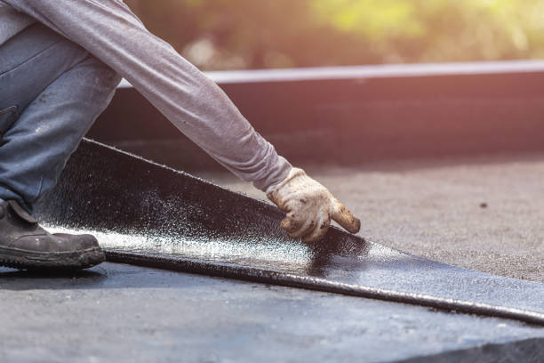 Professional Basement Waterproofing technician working in Attica, NY
